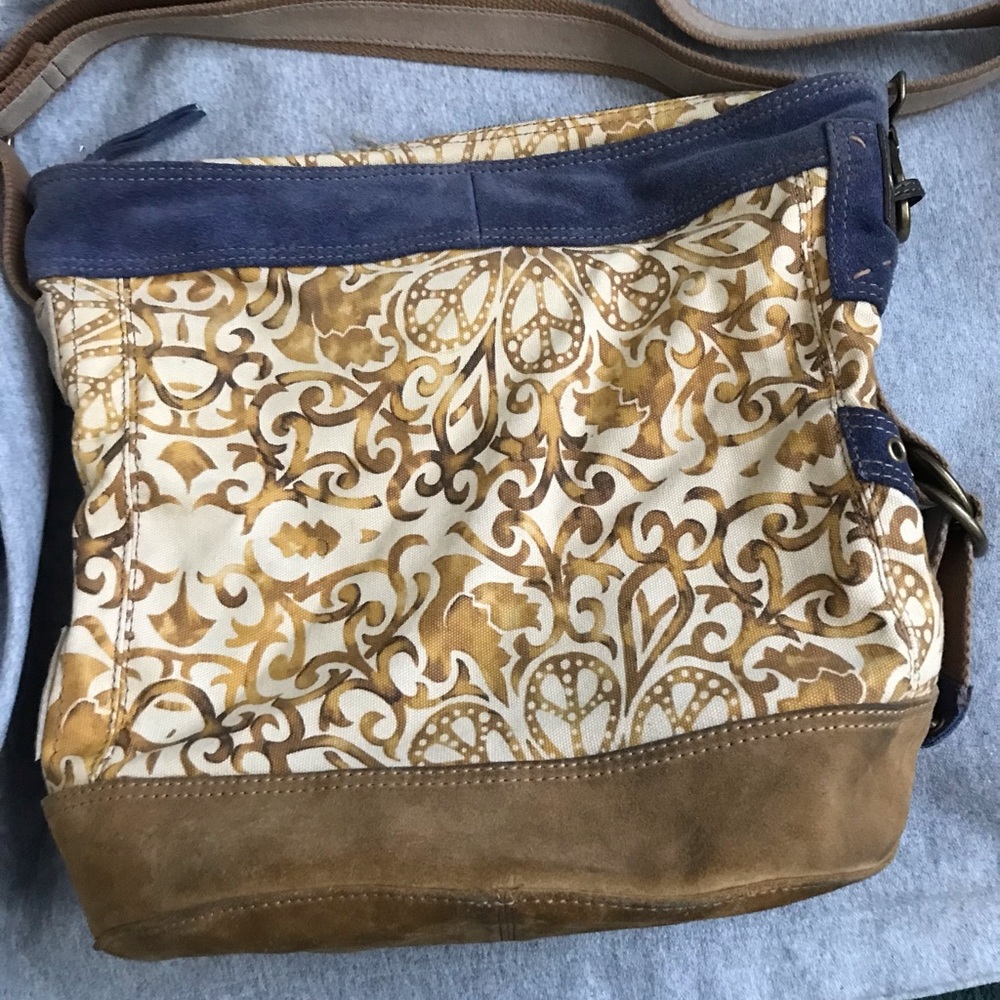 Large hobo Lucky Brand suede and canvas bag. Peace signs in the paisley pattern.